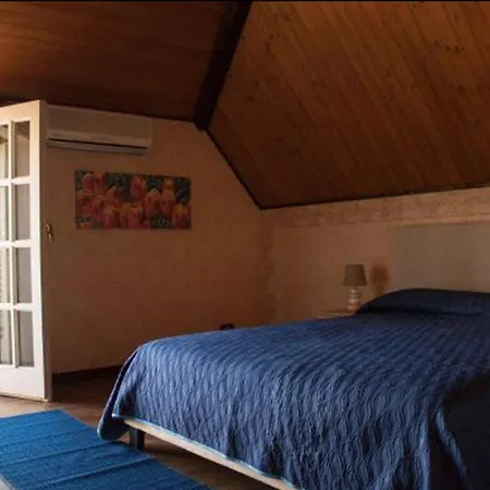 Quarto em Acomodações Particulares Small Paradise